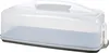 A rectangular cake carrier with a clear plastic lid and a gray base, shown from a slightly elevated side angle against a white background. Náhľad obrázku produktu