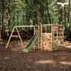 A wooden playground set with a slide, swings, and climbing wall, set in a forest environment. Voir les images du produit