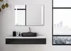 A modern bathroom vanity with a sink and a lighted mirror, with a city view through a large window. Produktbild-Vorschau