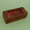Geschlossene Secret Box Heart aus dunklem Holz mit Herzsymbol – eine dekorative Knobelbox als Denkspiel. Náhľad obrázku produktu