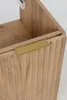 A close-up view of a wooden cabinet with a gold handle. Anteprima dell’immagine prodotto