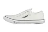 A side view of a white canvas sneaker. Produktbild-Vorschau