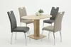 A dining set with a table and four chairs against a white background. Produktbild-Vorschau