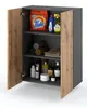 A bathroom cabinet with its doors open, displaying various cleaning and personal care products on its shelves. Voir les images du produit