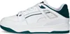 Side view of a white Puma sneaker with green accents. Produktbild-Vorschau