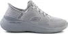 A side view of a gray Skechers slip-on sneaker against a white background. Produktbild-Vorschau