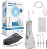 A Waterpik water flosser and its accessories are displayed on a white background, along with its packaging. Produktbild-Vorschau