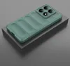 A green phone case with a textured back is displayed on a gray block against a gray background. Produktbild-Vorschau