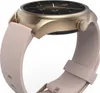 A close-up, side view of a smartwatch with a rose gold casing and a pink textured band. Produktbild-Vorschau