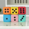 Six dice stacked in two rows of three, on a white surface. Produktbild-Vorschau