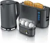 A set of kitchen appliances including a kettle, toaster, and egg cooker, displayed on a white reflective surface. Produktbild-Vorschau