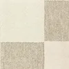 A close-up view of a carpet with a checkered pattern of cream and beige squares. Anteprima dell’immagine prodotto
