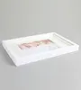 A white 3D object picture frame is shown at an angle on a light gray background. Produktbild-Vorschau