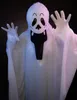 A person wearing a ghost costume with a mask and gloves. Anteprima dell’immagine prodotto