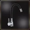 A kitchen faucet with a flexible black hose and silver accents, set against a dark, gradient background. Náhľad obrázku produktu