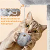 A cat playing with a toy ball attached to a cat tree. Podgląd zdjęcia produktu