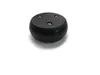 A black, round object with three screws on top, set against a white background. Produktbild-Vorschau