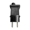 A close-up studio shot of a black electrical plug with a timer and dimmer module attached. Produktbild-Vorschau