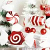 Christmas decorations with candy-themed ornaments and small white Christmas trees. Náhľad obrázku produktu