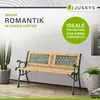 A wooden garden bench is displayed on a wooden deck next to a large potted cactus and a smaller potted plant. The background is a plain wall with a window visible on the right. Promotional text and a logo are overlaid on the image. Náhľad obrázku produktu