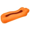 An orange inflatable lounger on a white background. Produktbild-Vorschau