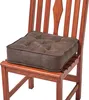 A brown seat cushion on a wooden chair. Náhled obrázku produktu
