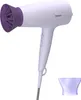 A white and purple Philips hair dryer is shown against a white background, with a purple nozzle accessory placed to the side. Podgląd zdjęcia produktu