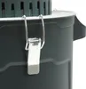 A close-up view of a latch mechanism on a dark gray container, with a green grate visible at the top. Podgląd zdjęcia produktu