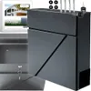 A dark grey mailbox is shown with its door open, revealing the interior. Accessories like screws and keys are placed on top. Náhľad obrázku produktu