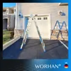 A multi-purpose ladder is set up in front of a garage door. Náhľad obrázku produktu