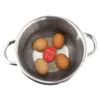 A pot of water with eggs and an egg timer. Voir les images du produit