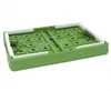 A green and white folding box shown from a diagonal angle against a white background. Produktbild-Vorschau