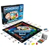 A Monopoly Super Electronic Banking board game box and its contents are displayed on a white background. Náhľad obrázku produktu