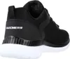 A black Skechers training shoe with a white sole, shown from the side and back. Anteprima dell’immagine prodotto