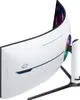 The back of a large, curved, white computer monitor with RGB lighting on the stand. Produktbild-Vorschau