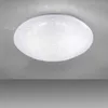 A white ceiling lamp with a starry sky effect mounted on a gray ceiling. Produktbild-Vorschau