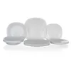 A set of white square plates and bowls arranged on a white background. Voir les images du produit