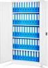 An open white metal filing cabinet filled with blue binders. Produktbild-Vorschau