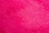 A close-up view of a fluffy pink carpet. Produktbild-Vorschau