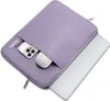 A lavender laptop sleeve with a laptop partially inserted, and a phone and mouse in the front pocket. Náhled obrázku produktu