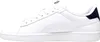 A side view of a white Puma sneaker with a navy heel accent. Produktbild-Vorschau