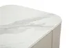 A close-up view of the corner of a nightstand with a marble-patterned top. Náhled obrázku produktu