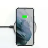 A smartphone is placed on a wireless charger, with a charging cable connected to the charger. Anteprima dell’immagine prodotto