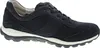 A side view of a navy blue sneaker with white and gray accents, set against a white background. Voir les images du produit