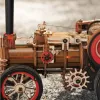 A close-up view of a wooden model steam engine, with a focus on the intricate details of its construction and mechanics. Produktbild-Vorschau