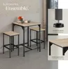 A bar set with two stools and a table, shown in a room setting with additional close-up shots of product features. Produktbild-Vorschau
