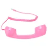 A pink retro telephone handset with a coiled cord and a 3.5mm jack connector, isolated on a white background. Náhľad obrázku produktu