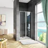 A modern bathroom with a shower cabin, window with curtains, and wooden floor. Produktbild-Vorschau