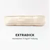 A cream-colored cushion with a handle, presented against a white background. Náhled obrázku produktu