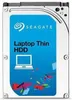 A Seagate Laptop Thin HDD is shown against a white background with colorful confetti scattered around it. Náhled obrázku produktu